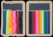 crayons de couleur et ardoises doubles sur fond noir crayons de couleur et ardoises doubles sur fond noir