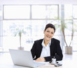 Businesswoman working on computer Businesswoman working on computer