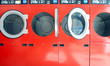 washing machines in a laundrette in a row
