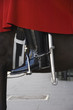 Close up of a shiny Cavalry Boot and red tunic of solider on gua Close up of a shiny Cavalry Boot and red tunic of solider on gua