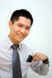 Asian male happy with mobile phone