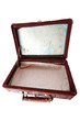 dusty open brown leather suitcase
