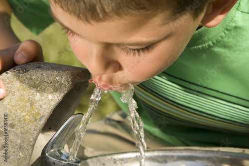 Photo: Boy drinking Boy drinking