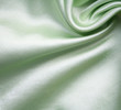 Smooth elegant green silk as background Smooth elegant green silk as background
