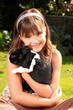Photo: Mädchen mit Kaninchen auf dem Arm Mädchen mit Kaninchen auf dem Arm