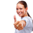 Lovely young female showing a thumbs up on white