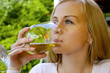 Beautiful woman drinking wine in the restaurant.