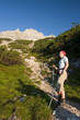 Woman in the summer Alps