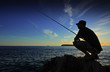 Man fishing on sunset