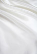 Smooth elegant white silk as background Smooth elegant white silk as background