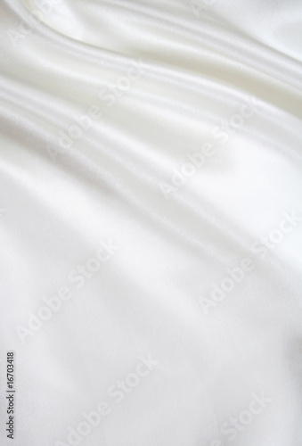 Photo : Smooth elegant white silk as background Smooth elegant white silk as background