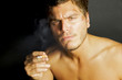 Young Sexy Man Smoking a cigarette Young Sexy Man Smoking a cigarette
