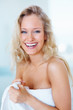 Portrait of a beautiful woman wrapped in a towel