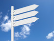 Foto: Blank white sign on a blue cloudy sky Blank white sign on a blue cloudy sky