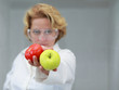 Female scientist offering natural food Female scientist offering natural food