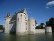 chateau au milieu de l'eau
