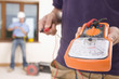 Close up of electrician holding voltmeter