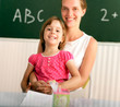 Teacher and schoolchild