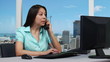 Young business woman with phone - skyline background