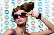 girl in the fashion sunglasses with creative hairstyle