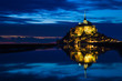 Mont St. Michel reflected in the sea at night Mont St. Michel reflected in the sea at night