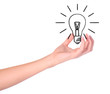 Hand holding drawn light bulb Hand holding drawn light bulb