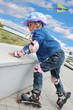child on in-line skates
