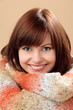 Portrait of beautiful woman on brown background