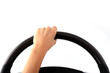 Female hand on a steering wheel