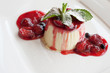 panna cotta dessert with wild berry sauce panna cotta dessert with wild berry sauce
