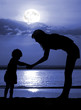 Silhouettes of the women and child on moon night