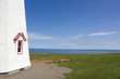 Lighthouse overlooking atlantic ocean shot in PEI, Canada