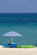Umbrella on a sandy beach.