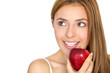 Woman eating a red apple