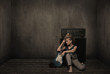 Girl with guitar in a vintage room