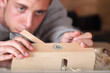 Carpenter working with plane Carpenter working with plane