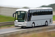 Fast moving tourist bus. Clipping path inside.