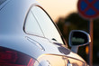car in front of a traffic sign car in front of a traffic sign