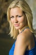 Beautiful Blond Woman In Blue Dress Bathed In Golden Sunshine