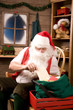 Photo: Santa Claus in Workshop With Bag of Letters Santa Claus in Workshop With Bag of Letters