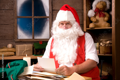 Photo: Santa Claus in Workshop With Bag of Letters Santa Claus in Workshop With Bag of Letters