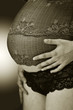 Bauch einer schwangeren Frau