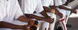 Baseball players sitting in dugout