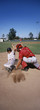 Baseball player sliding into base