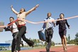 Business People Crossing the Winning Line