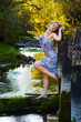Beautiful young woman relaxing on nature.