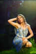 Beautiful young woman relaxing on nature.