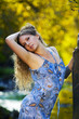 Beautiful young woman relaxing on nature.