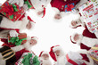 Group of men dressed as Santa Claus, looking down, low angle view