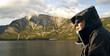 Young man sailing in the Sognefjord Young man sailing in the Sognefjord